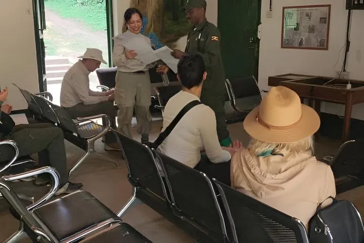 Visitors at a ranger briefing in a park office before the trek